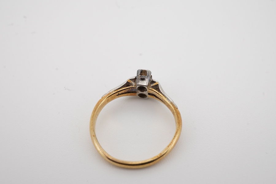 An Art Deco 18ct, plat and two stone diamond set ring, size K, gross weight 2.5 grams. Condition - fair to good